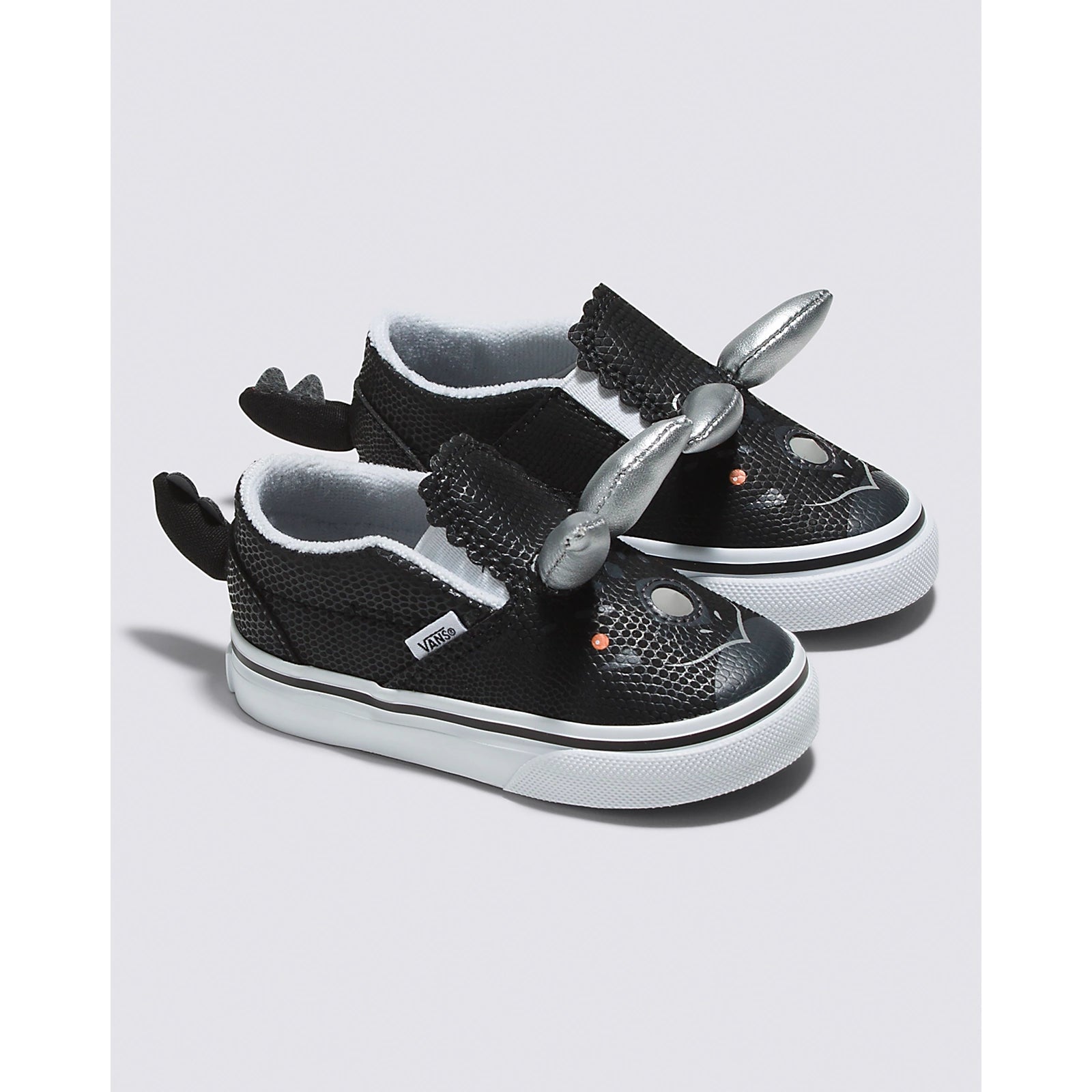 Dinosaur slip on vans best sale